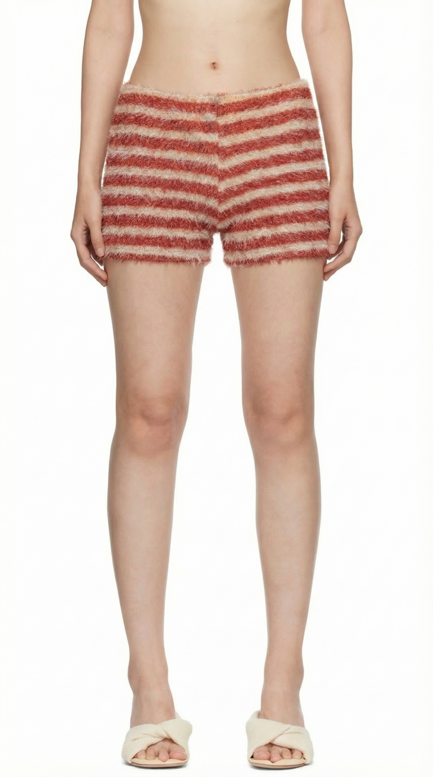 model wearing red and tan striped fuzzy shorts